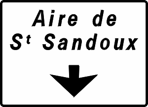 Arrow indicates lane will exit to rest stop (<em>Aire</em>).