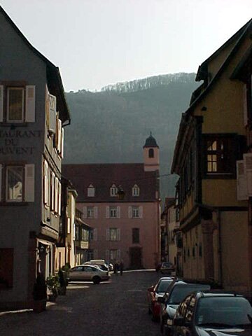 Medieval street with a view of hills